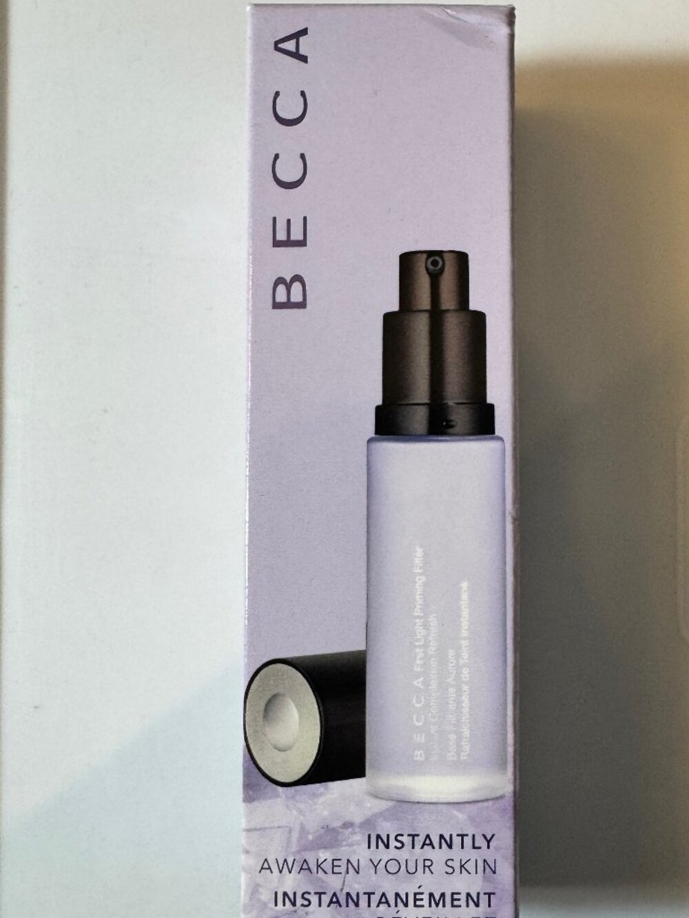 BECCA first light Cool Light Technology: Uses a sheer, cool violet light NWB